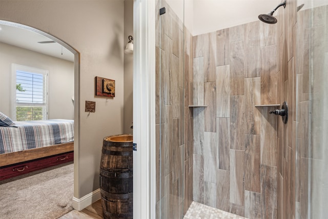 bathroom featuring tiled shower