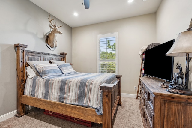 carpeted bedroom with ceiling fan