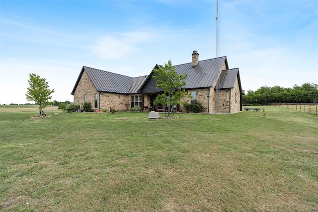 view of front of home featuring a front lawn