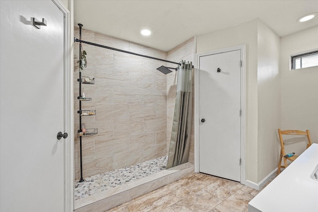 bathroom featuring walk in shower