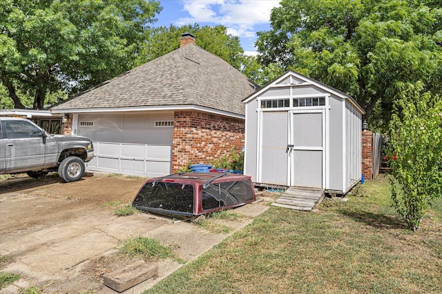 view of outbuilding featuring a yard