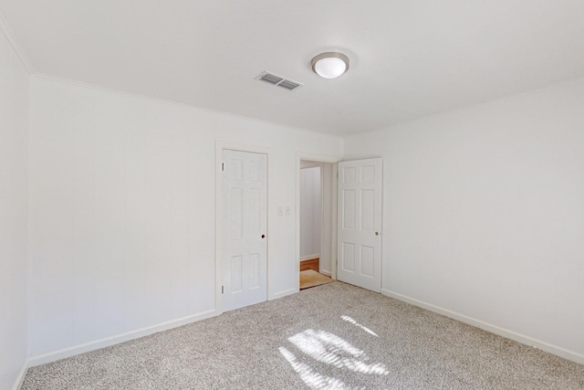 unfurnished room with carpet floors