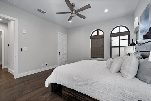 bedroom featuring ceiling fan and dark hardwood / wood-style flooring