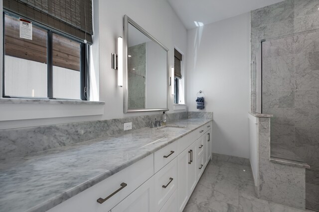 bathroom with tile patterned floors and vanity