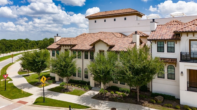 exterior space featuring a balcony