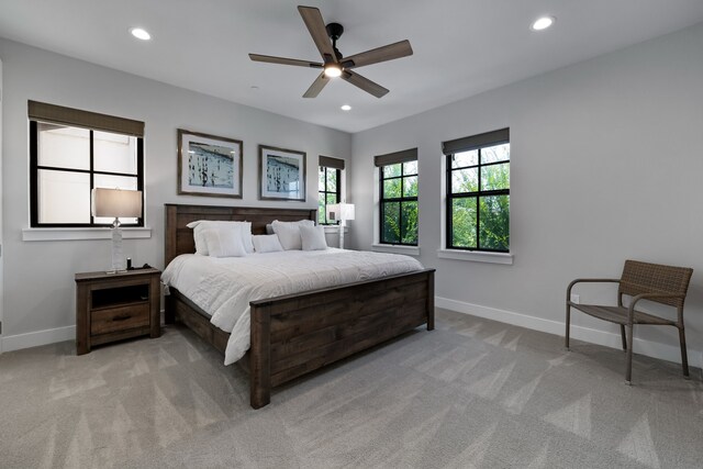 carpeted bedroom with ceiling fan