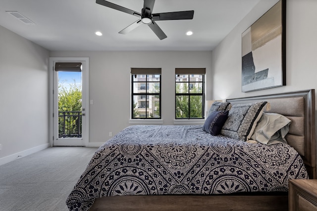 bedroom featuring multiple windows, light carpet, access to outside, and ceiling fan