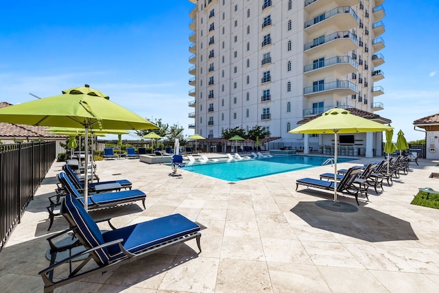 view of swimming pool featuring a patio