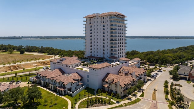 birds eye view of property with a water view