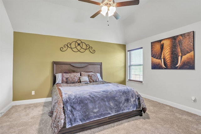 carpeted bedroom featuring ceiling fan and vaulted ceiling