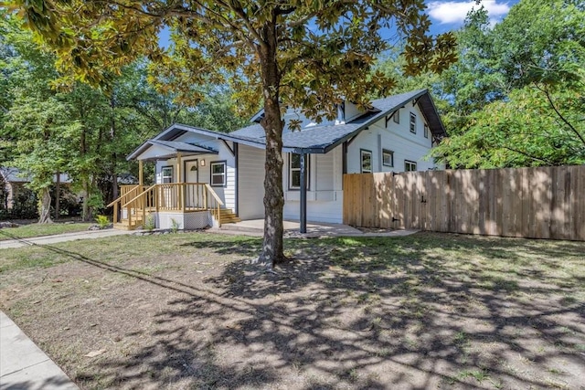 view of front of home with fence