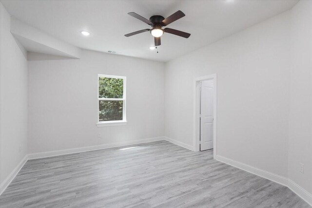 254 19th St SE, Paris, TX 75460 - spare room featuring wood finished floors, ceiling fan, baseboards, and recessed lighting