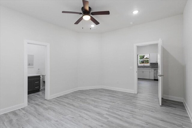 254 19th St SE, Paris, TX 75460 - spare room featuring a ceiling fan, light wood-type flooring, baseboards, and recessed lighting