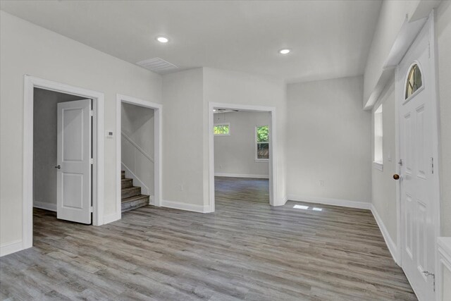 interior space featuring stairs, recessed lighting, and light wood-style floors