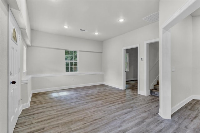 unfurnished room featuring light wood-type flooring