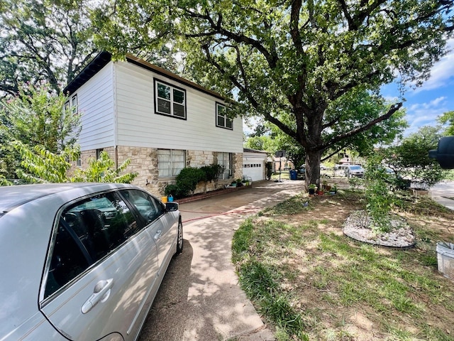 view of property exterior with a garage