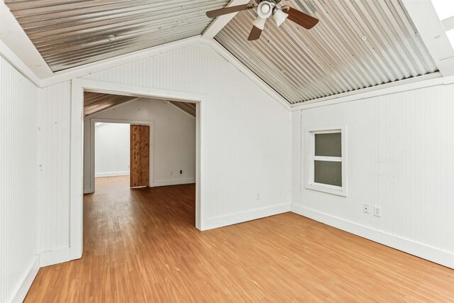 bathroom with wood-type flooring, vanity, and ceiling fan