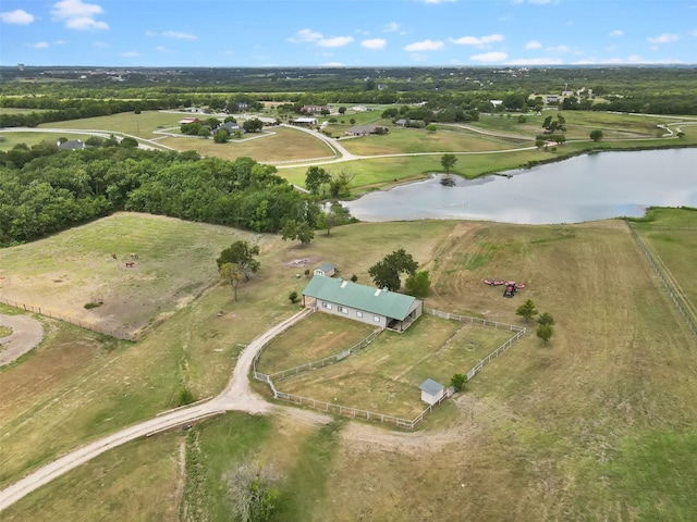 birds eye view of property with a rural view and a water view