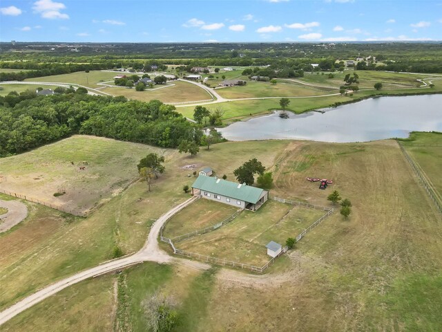 bird's eye view with a water view and a rural view