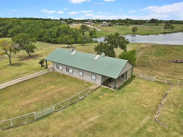 drone / aerial view with a rural view and a water view