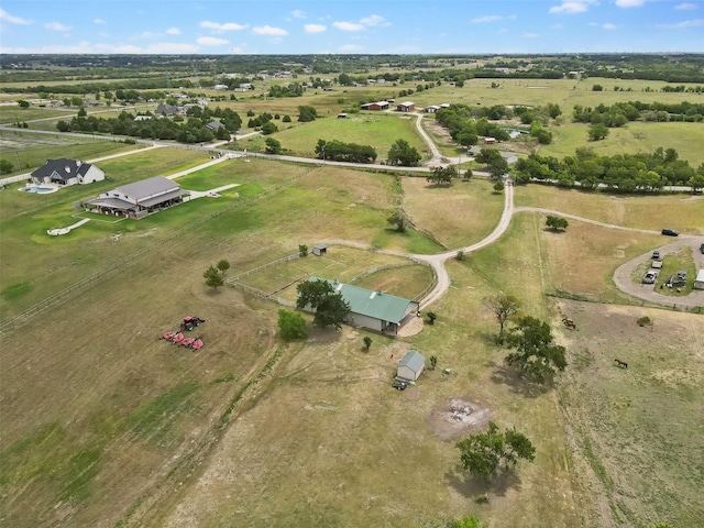 birds eye view of property featuring a rural view