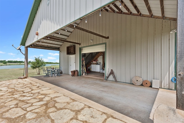 view of patio / terrace with a water view