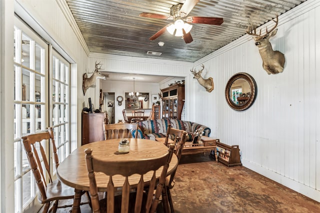 dining room featuring ceiling fan, ornamental molding, and french doors