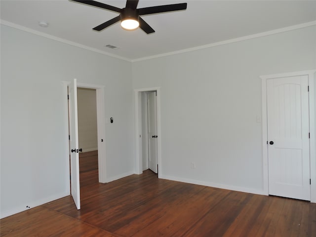 spare room with wood-type flooring, ceiling fan, and crown molding