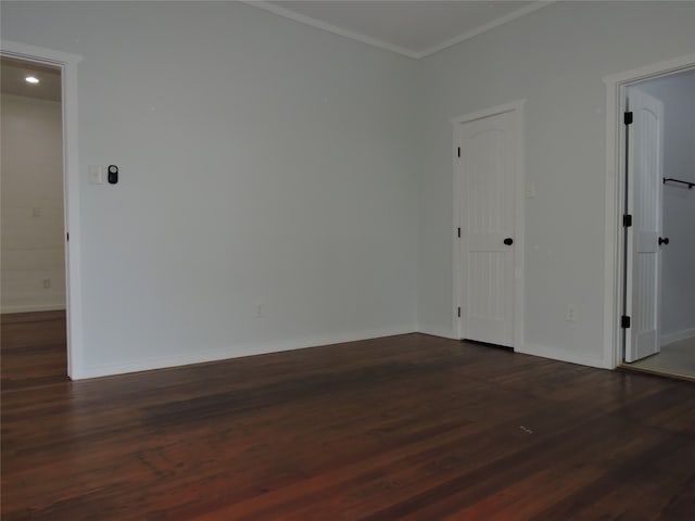 spare room with hardwood / wood-style flooring