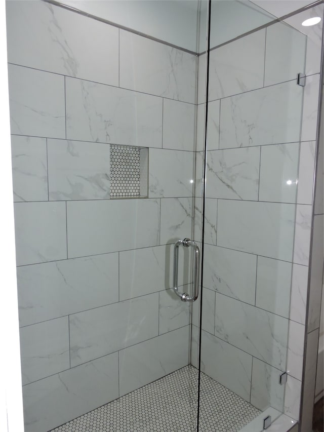 bathroom with an enclosed shower