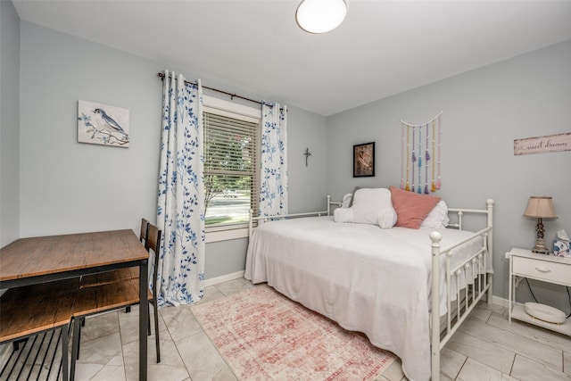 bedroom with baseboards