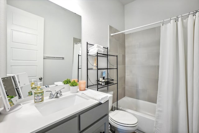 full bathroom featuring vanity, toilet, and shower / bathtub combination with curtain