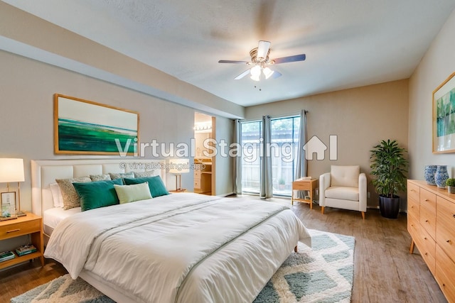 4944 Amesbury Dr Unit 106, Dallas, TX 75206 - bedroom with wood finished floors, a ceiling fan, and access to exterior