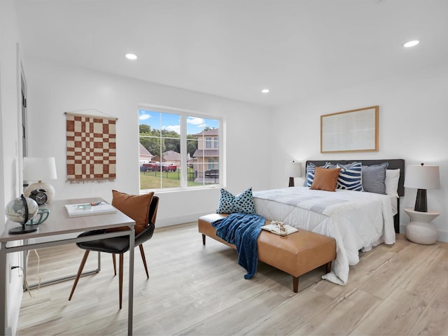 bedroom with light wood-type flooring