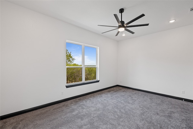 unfurnished room featuring carpet and ceiling fan