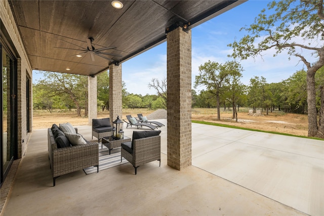 view of patio / terrace featuring ceiling fan