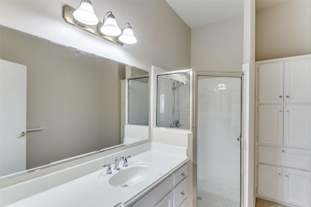 bathroom with vanity and walk in shower