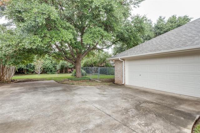 garage with a lawn