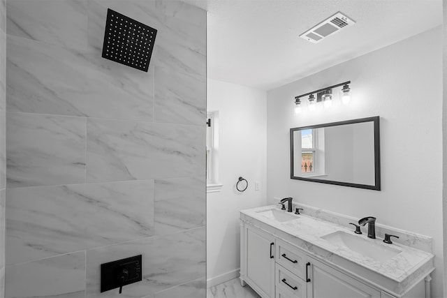 bathroom featuring double vanity