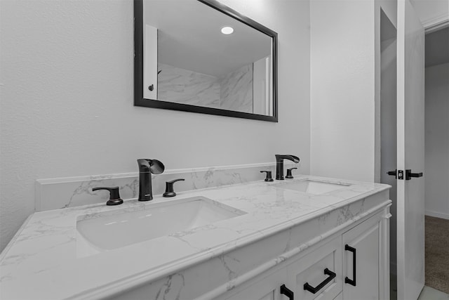 bathroom featuring double vanity