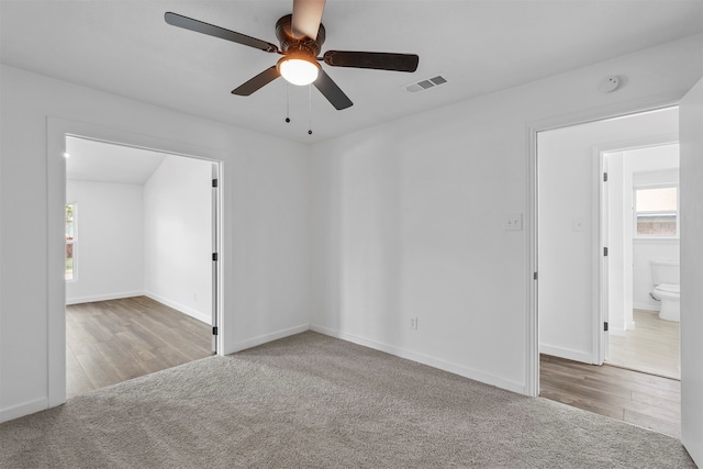 empty room featuring carpet and ceiling fan