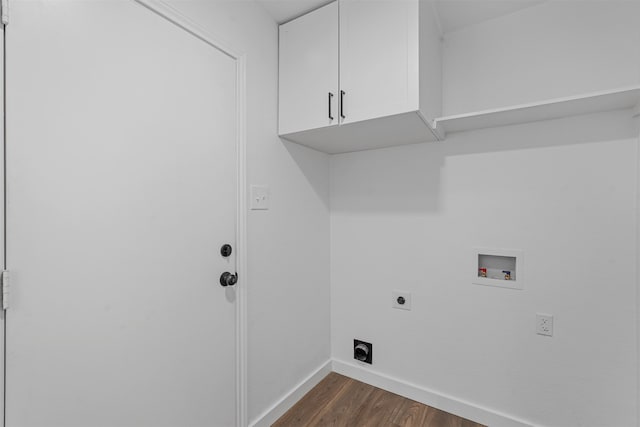 washroom featuring cabinets, dark hardwood / wood-style flooring, hookup for a washing machine, and hookup for an electric dryer