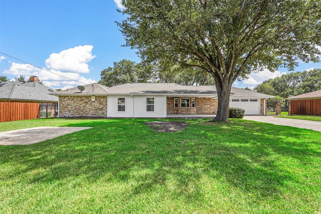 ranch-style house with a garage and a front lawn