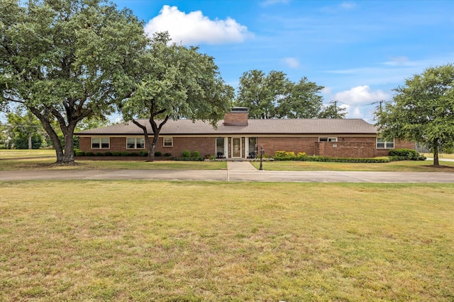 ranch-style house with a front yard