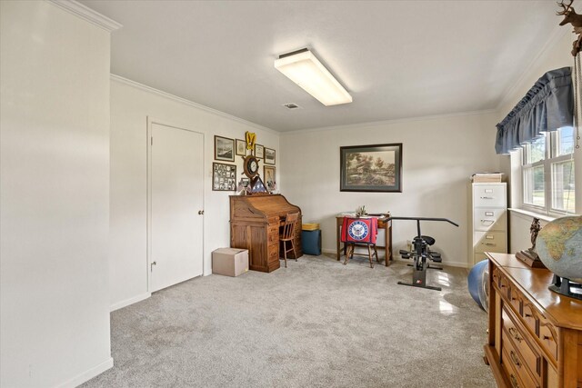 sitting room featuring crown molding and light colored carpet