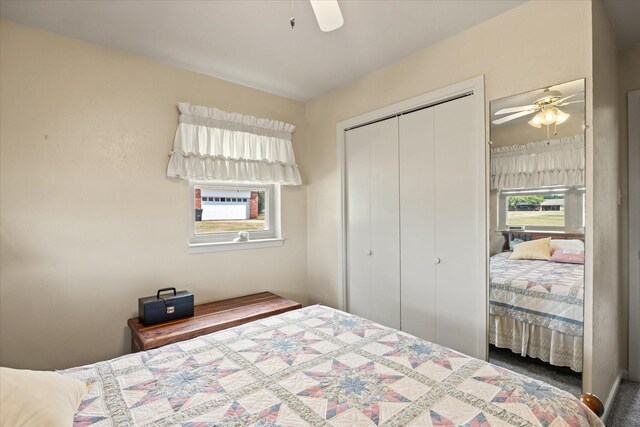 bedroom with a closet, carpet floors, and ceiling fan