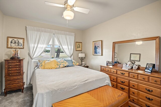 carpeted bedroom featuring ceiling fan