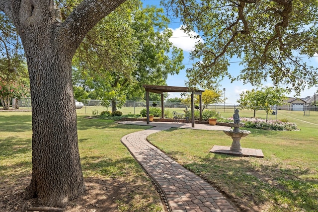 view of home's community featuring a lawn