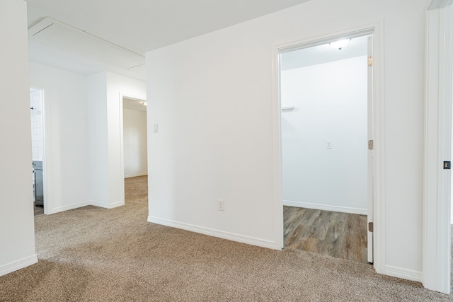 empty room with light colored carpet