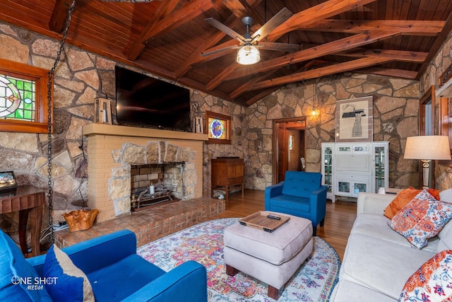 living room with wood ceiling, wood-type flooring, and beam ceiling